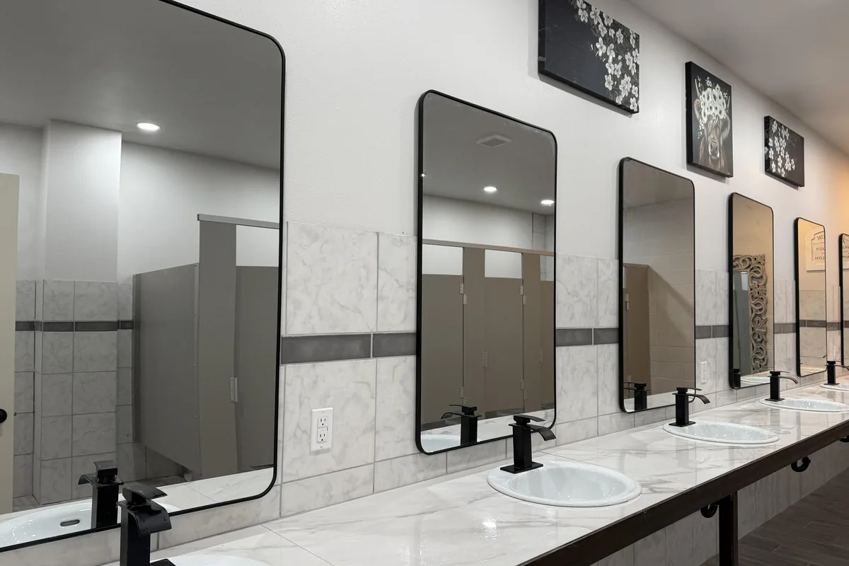 Private tiled showers in the Twin Oaks bathhouse