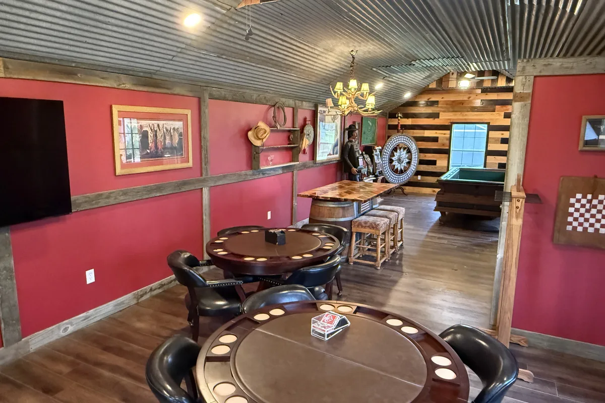Western game room with tables and vintage machines